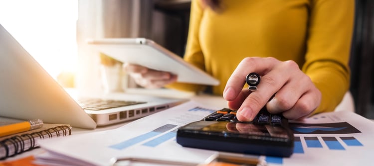 Business women using calculator with computer laptop, Business accounting, budget and loan paper in office-